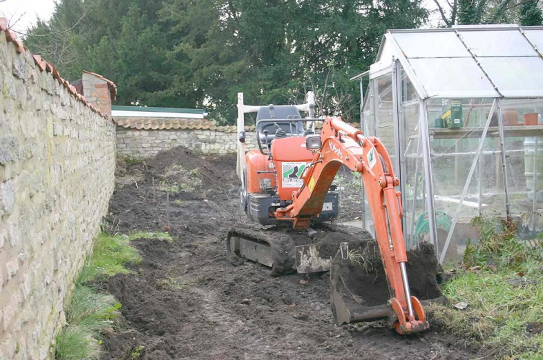 Boiler inspector visits, more digging on the garden railway
