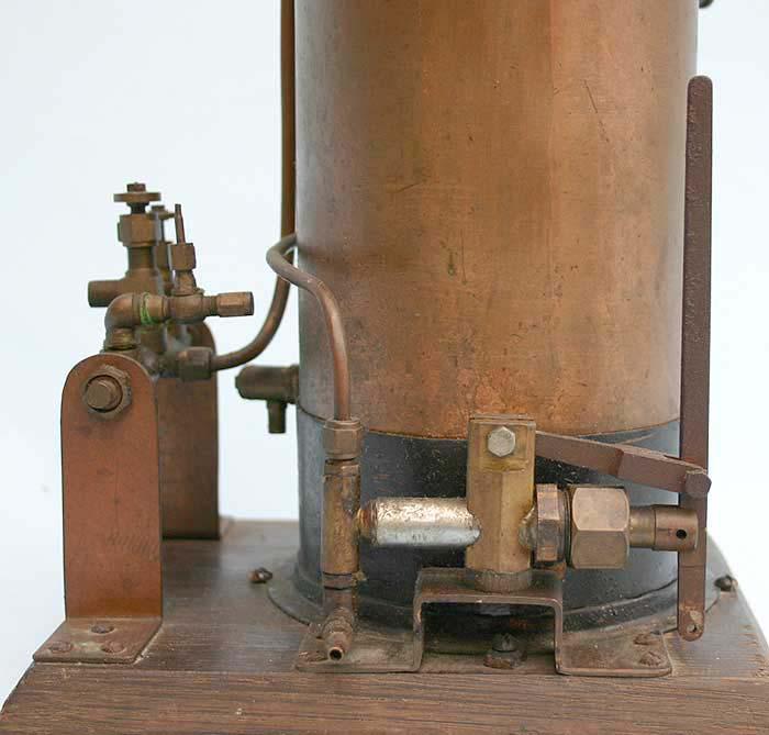 Vertical boiler with hand pump
