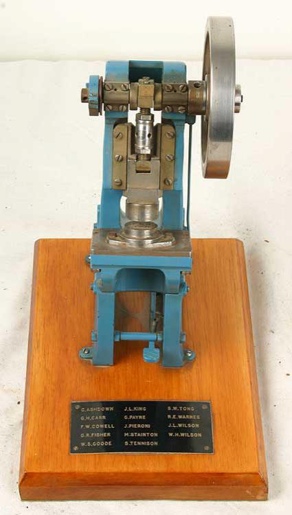 Model toggle press