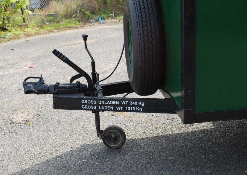 Portable track with trailer