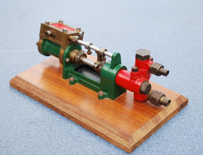 Stuart steam pump on wooden base