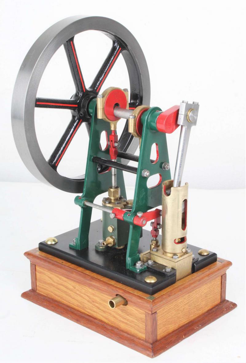 Vertical engine with pump on hardwood base