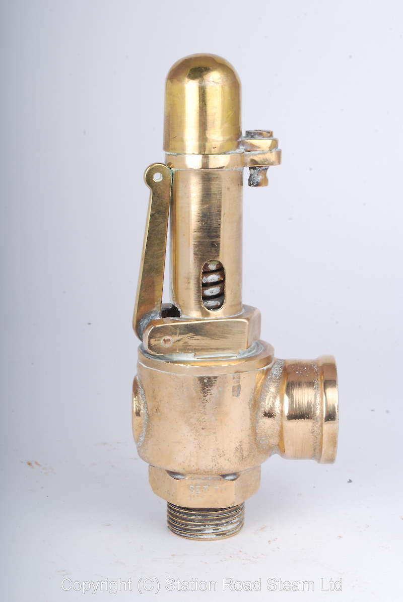 Three Nabic polished brass safety valves