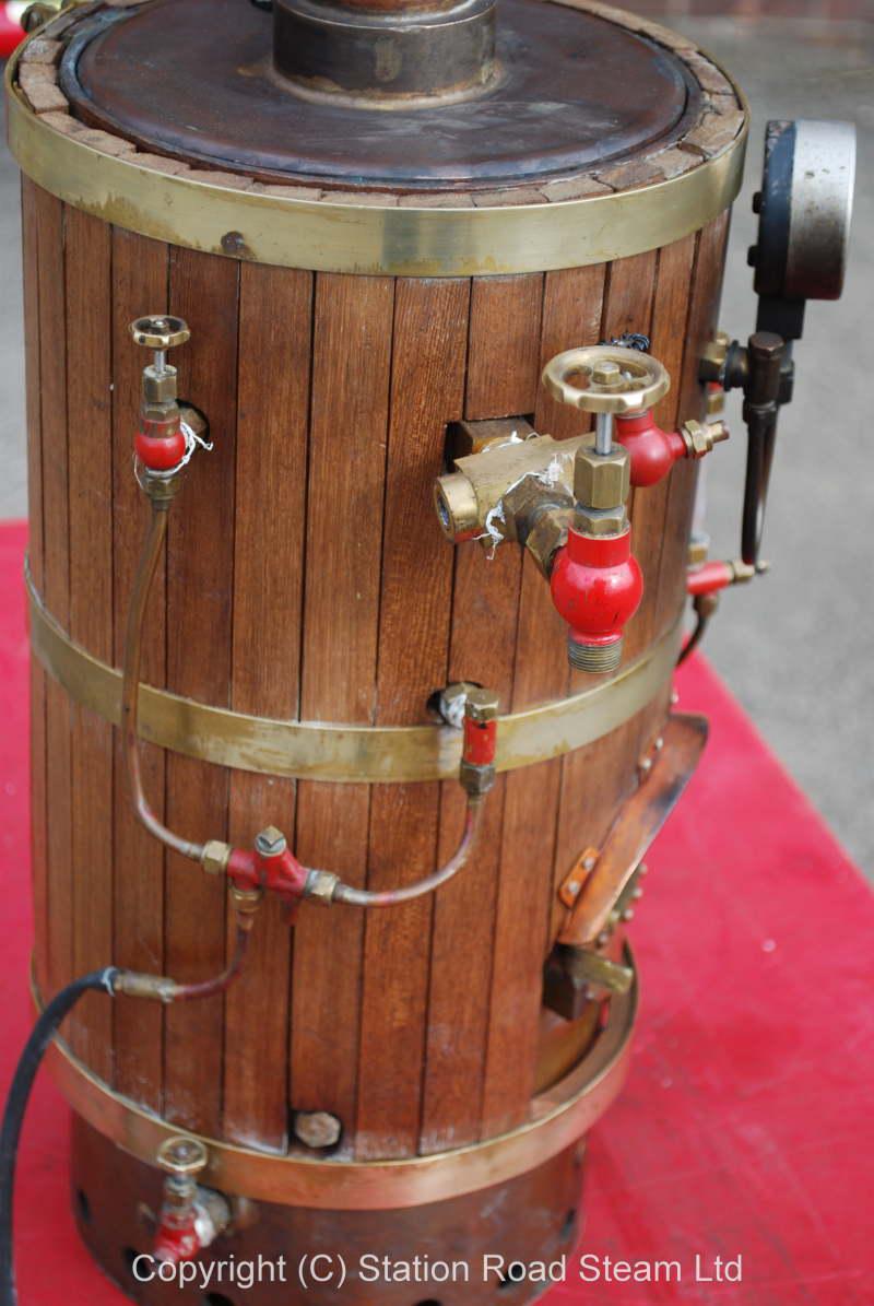 Large wooden clad copper vertical boiler