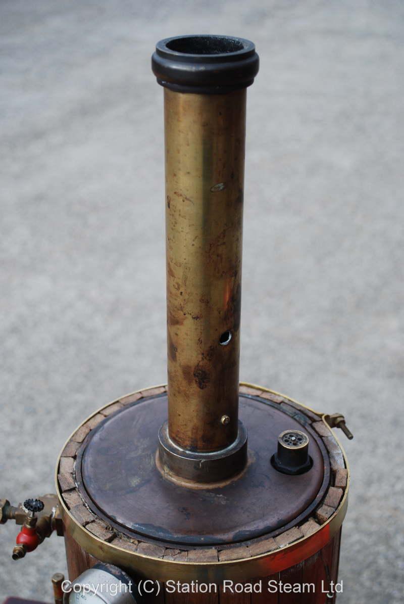 Large wooden clad copper vertical boiler