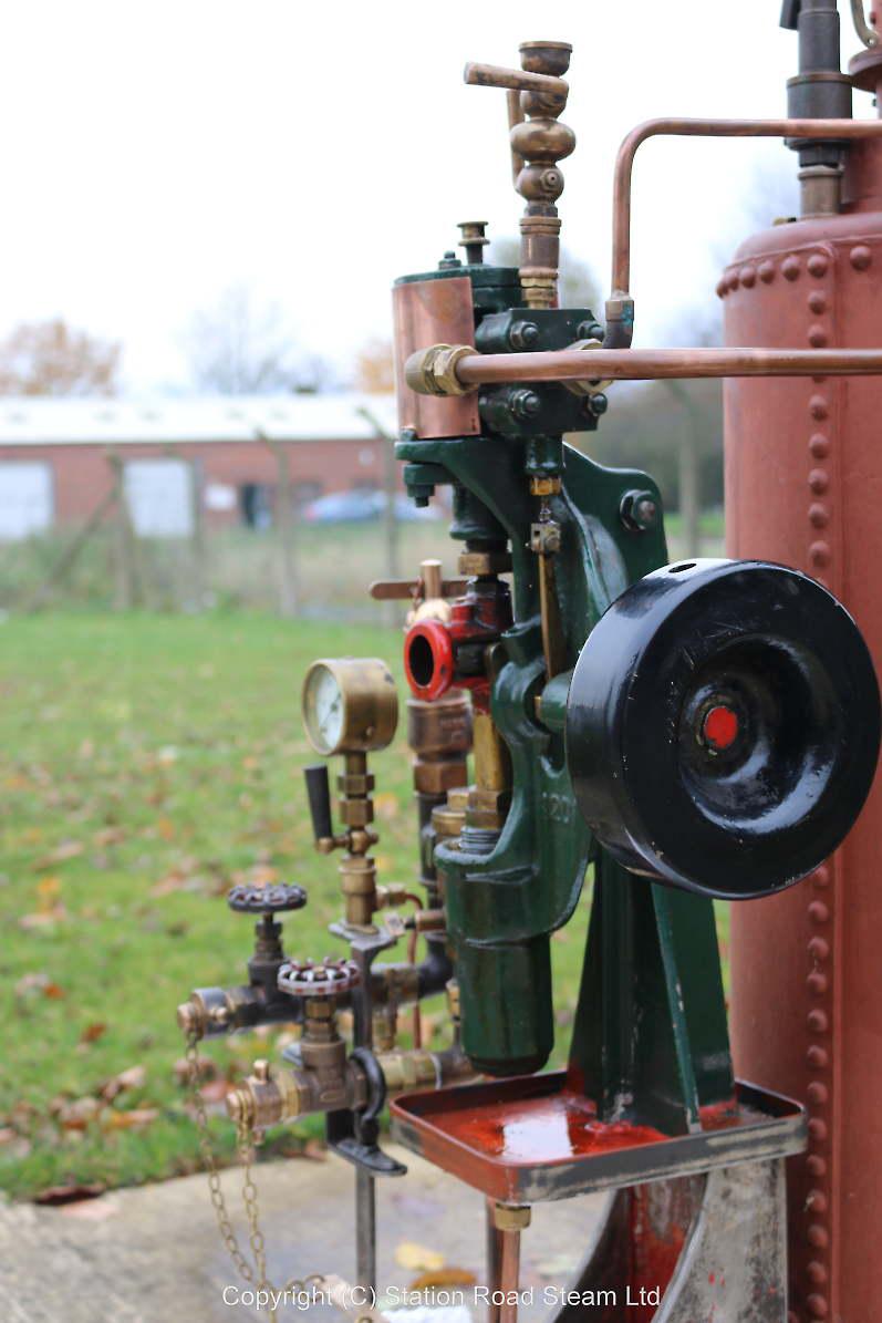 Vertical boiler with steam pump