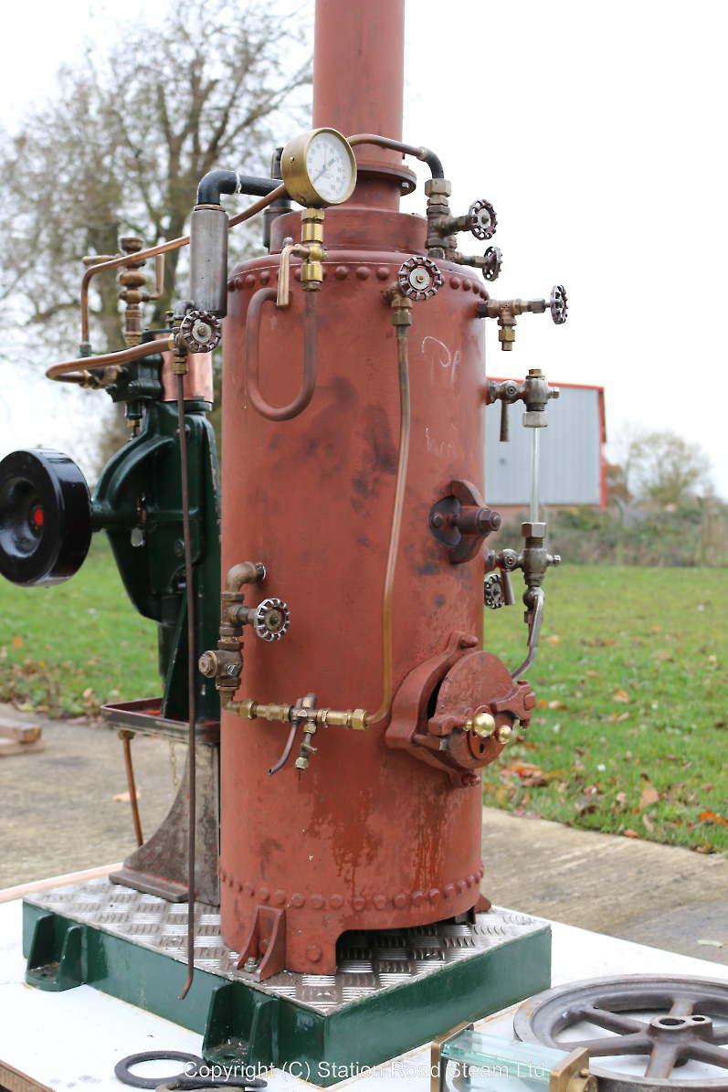 Vertical boiler with steam pump