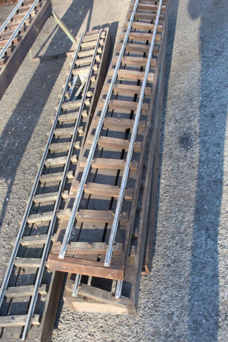 Five panels of 5 inch gauge raised level track with trestles