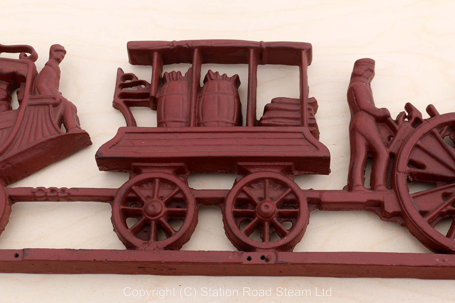 Cast iron wall plaque of early train