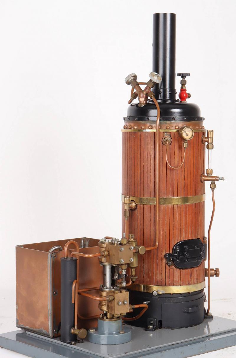 Coal-fired vertical boiler with steam pump