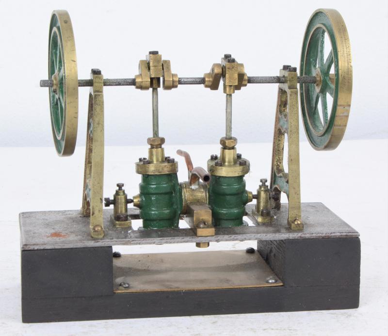 Twin cylinder vertical oscillating engine