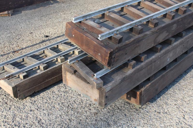 Five panels of 5 inch gauge raised level track with trestles
